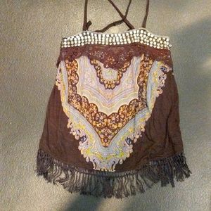 Free people size small drapey tank. Criss Cross is in the back with fringe.